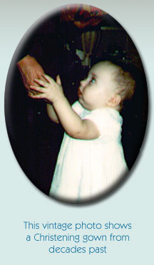 This vintage photo shows a Christening gown from decades past.